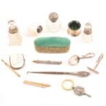 A selection of silver and ivory items, to include a baby's spoon set, miniature purse, scent