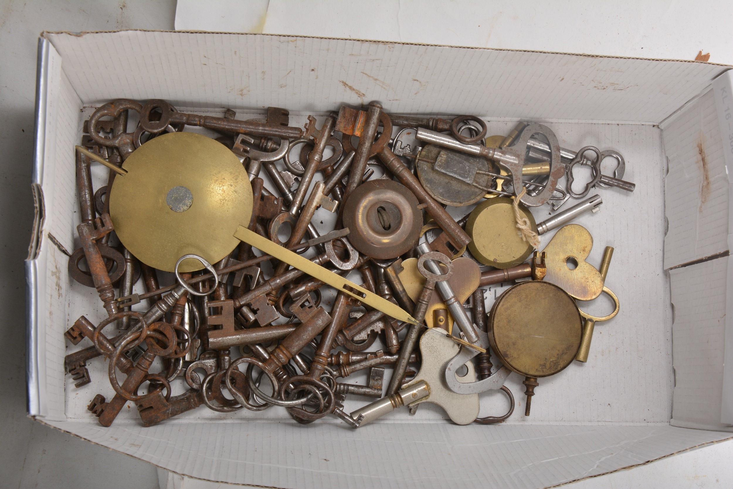 A collection of 18th Century and later keys and brass door knockers - Image 2 of 2