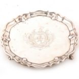 A George II circular silver card tray by Robert Abercromby, London1737.