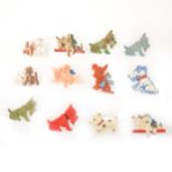 Twelve vintage celluloid and plastic Scottie dog brooches