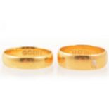 Two 22 carat gold plain wedding rings.