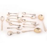 Quantity of silver flatware, teaspoons, fruit spoons, souvenir spoons, golf interest.