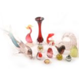 A collection of glass paperweights, and other ornamental glassware,.