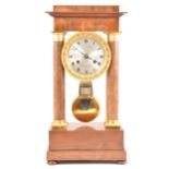 A Charles X mahogany and gilt metal portico clock,