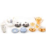 A quantity of part tea sets, decorative plates, and other decorative ceramics.