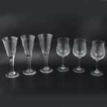 Six wheel engrave hunting goblets, and six Dartington crystal flutes.