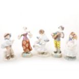 Various ceramic figurines including Coalport, Doulton, and Continental porcelain.
