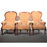 Pair of Victorian mahogany spoon-back easy chairs, and a similar chair.