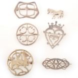 Six Scottish hallmarked silver brooches, Ola May Gorie, Shetland Silvercraft, Stuart John Wilson.