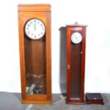 An IBM International electric factory clock, and two other clocks