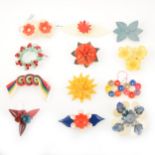 Twelve wartime austerity chic celluloid floral brooches, 1940's vintage.
