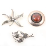 N E From of Denmark - three named silver brooches.