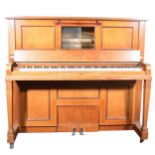A Steck upright Pianola Piano.