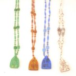Four Egyptian Revival pressed glass scarab bead sautoir necklaces.