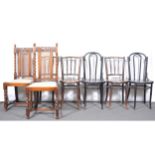 Pair of oak high-back dining chairs, cane panels, drop-in seats, height 110cm; and five bentwood