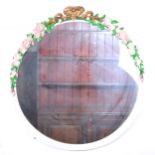 Painted circular wall mirror, ribbon-tie cresting, rose sprays.