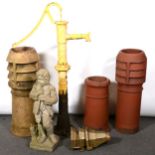 Old painted cast iron pump, cast concrete figure of a boy, terracotta chimney poits, etc