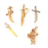 Four sword/dagger brooches, lucite, paste and a silver-gilt knight