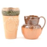 A Doulton Lambeth stoneware commemorative beaker and Royal Doulton commemorative jug.