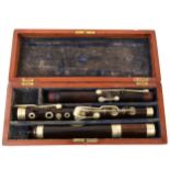 Rosewood flute, 19th century, nickel-plated mounts.