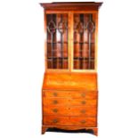 A George III mahogany bureau bookcase.