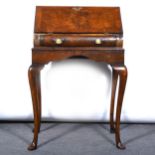 Queen Anne inspired walnut bureau, 20th Century.