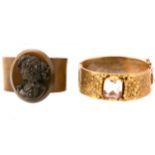 Victorian style half hinged bangle and an early celluloid cameo mourning bangle.