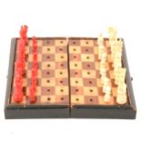 19th Century stained bone travel chess set and playing card set.