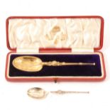 Silver-gilt anointing spoon by Reid & Sons, London 1910, cased, another silver similar.