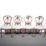 Set of four salon chairs.
