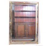 Contemporary gilt metal wall mirror.