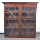 Mahogany bookcase top.