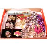 Vintage costume jewellery with a pink theme, necklaces, brooches, earclips,