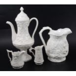 A Samuel Alcock & Co white stoneware jug, plus other white pottery items.