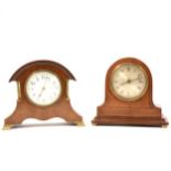 Two Edwardian inlaid mahogany mantel clocks.