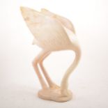 Southern African carved soapstone model of a flamingo.