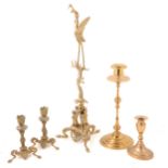 Brass candlesticks and centrepiece.