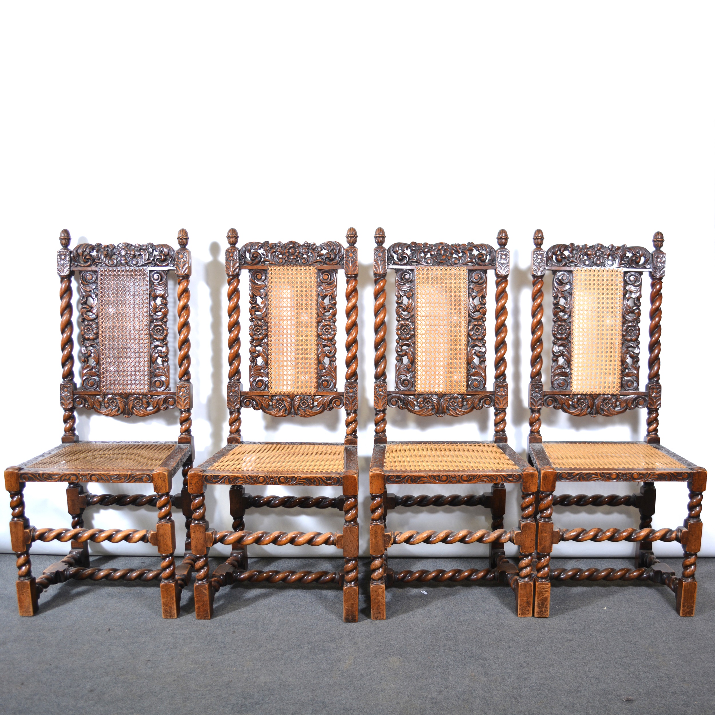 Set of six Carolean style oak dining chairs