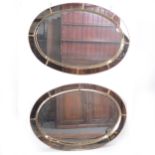 Suite of six contemporary gilt metal oval mirrors.