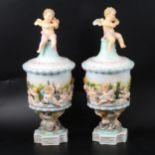 Pair of Continental porcelain urn-shaped vases.