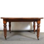 Victorian oak wind-out dining table,