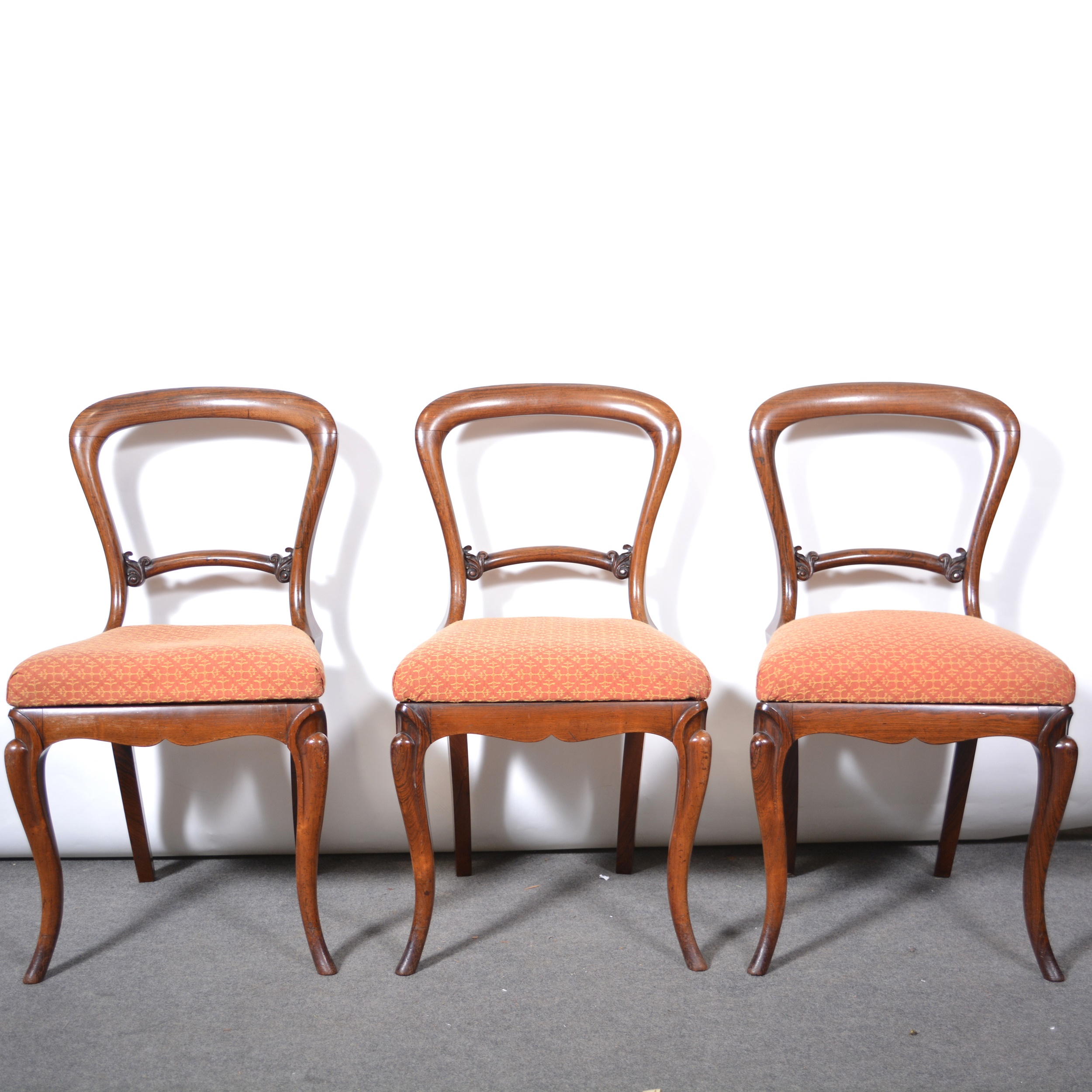 Set of six Victorian rosewood balloon back dining chairs,