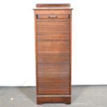 Oak tambour front filing cabinet,