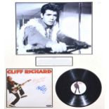 Two framed signatures; Cliff Richard and Larry Hagman