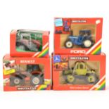 Britains Toys; four model tractors including no.9529 Massey Ferguson (dual wheels) etc