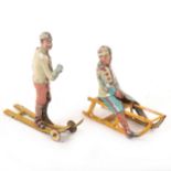 Two early 20th century tin-plate penny toys.