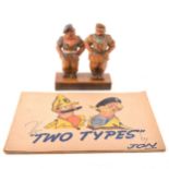 The Two Types by Jon, paperback comic illustrated book and carved figure.