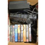 Sega Mega Drive, games and a PlayStation 2