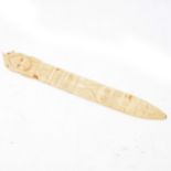 Carved bone paperknife, Native American iconography