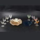Wine glasses, liqueur glasses and other glasswares.